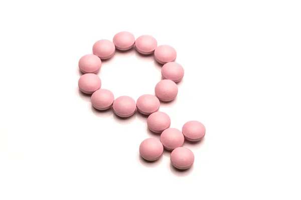 Ženské Pohlaví Symbol Vyrobený Růžové Kulaté Pilulky Bílém Pozadí — Stock fotografie