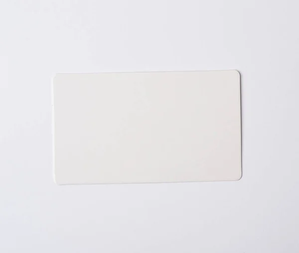 Lege Rechthoekige Papier Wit Visitekaartje Witte Achtergrond Top View Close — Stockfoto