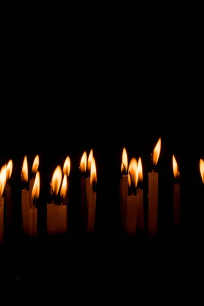 Many Christmas Candles Burning Night Black Background Candle Flame Set — Stock Photo, Image