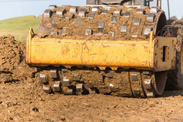 建設産業土木工事埋立砂石クローズ アップ抽象を平準化圧縮機機械の振動 — ストック写真