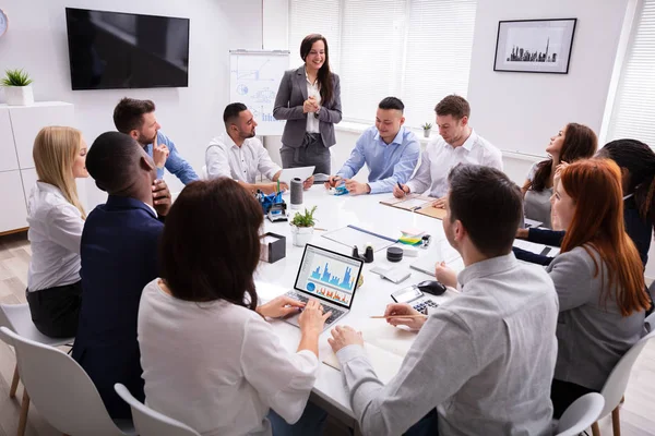 Group Smiling Young Multi Ethnic Businesspeople Looking Businesswoman Giving Presentation — Stock Photo, Image