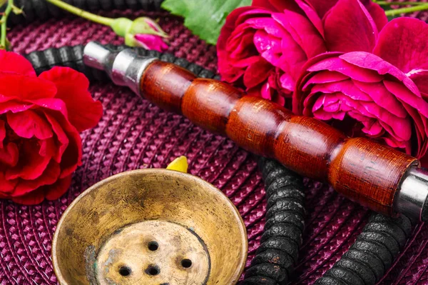 Smoking hookah with floral tobacco flavor.Shisha smoking