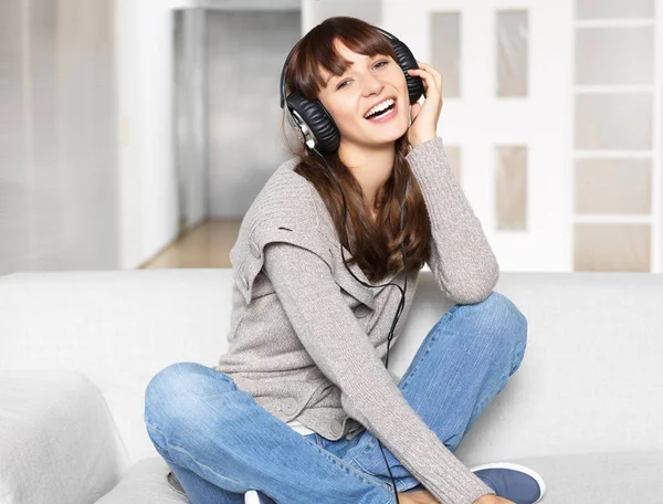 young woman listens to music