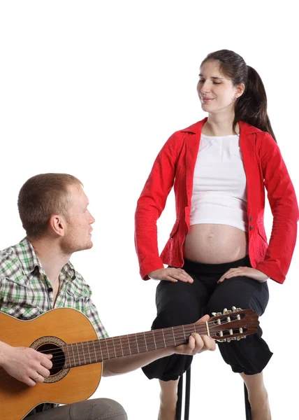 Young Husband Plays Guitar Pregnant Wife Future Child White Background — Stock Photo, Image