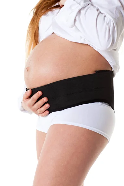 Mujer Embarazada Con Corsé Sobre Fondo Blanco —  Fotos de Stock