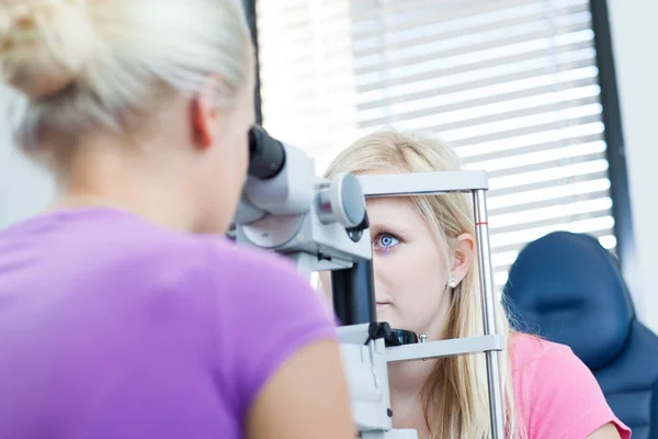 Optometry Concept Pretty Young Female Patient Having Her Eyes Examined Stock Photo