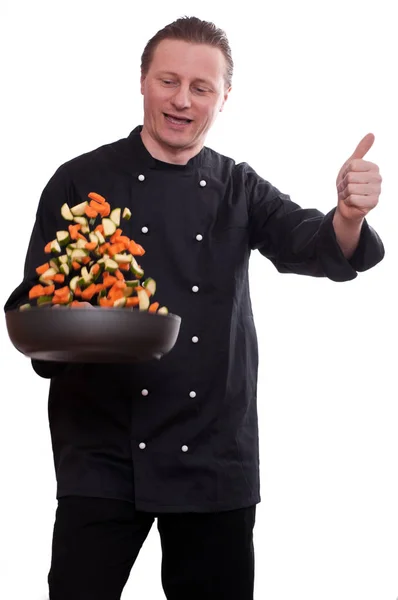 Een Chef Kok Zet Met Succes Groenten Een Pan Houdt — Stockfoto