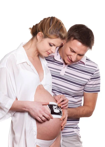 Feliz Familia Embarazada Con Una Imagen Ultrasonora Futuro Bebé Sobre —  Fotos de Stock