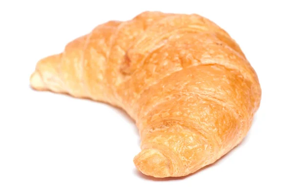 Ein Croissant Von Der Seite Und Ein Weißer Hintergrund — Stockfoto