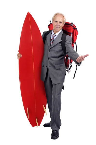 Mature Businessman Hitchhiking Backpack Surf Board Royalty Free Stock Photos