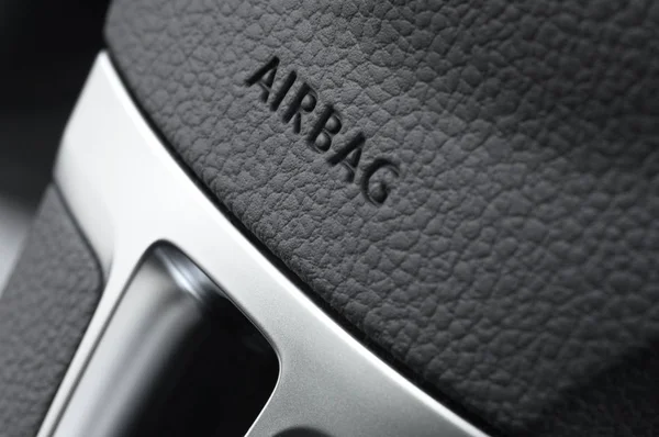 Close Van Een Stuurwiel Airbag Script — Stockfoto