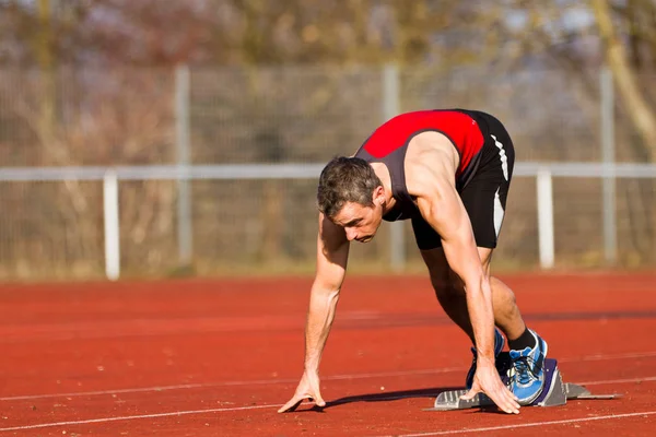 Giovane Che Corre Sullo Stadio — Foto Stock