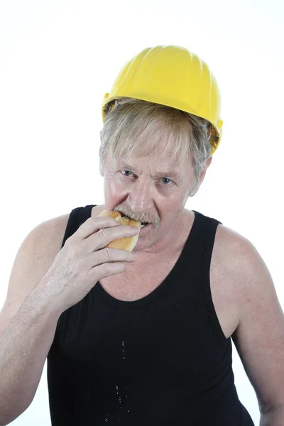 Trabalhador Construção Comendo Pão — Fotografia de Stock