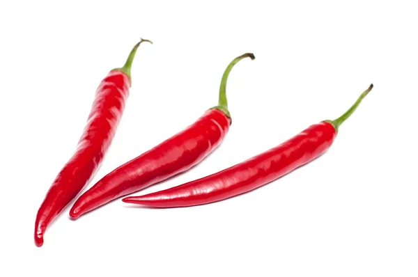 Drei Rote Paprika Weiß Isoliert — Stockfoto