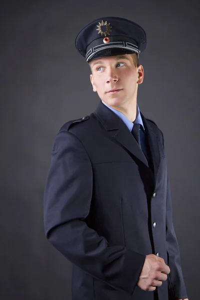 young policeman in police uniform