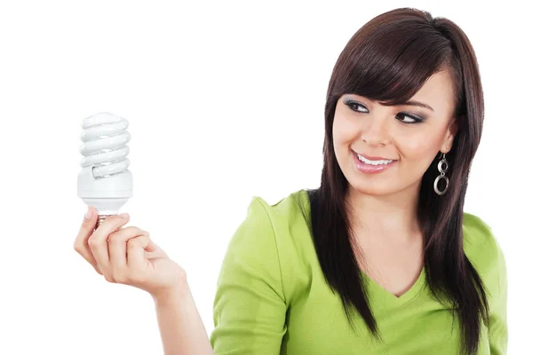 Image Stock Jeune Femme Regardant Une Ampoule Fluorescente Compacte Isolée — Photo