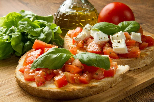 Italian Bruschetta Fresh Tomatoes Basil Garlic Olive Oil Cheese — Stock Photo, Image