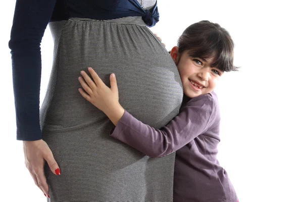 Details Van Een Pregant Vrouw Met Haar Dochter Geïsoleerd Wit — Stockfoto