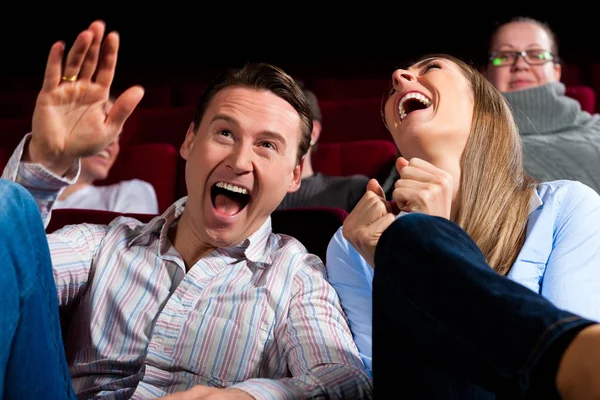 couple and other people in the cinema