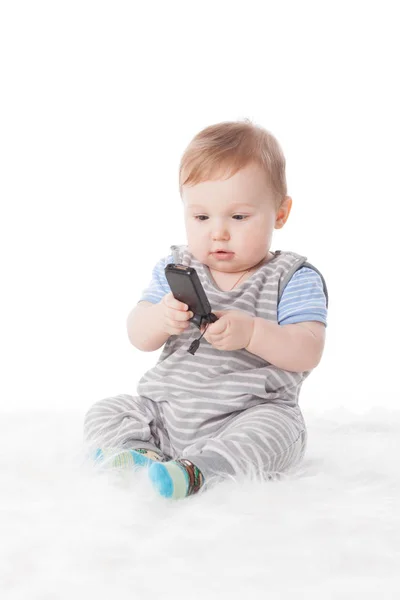 Doux Petit Bébé Avec Téléphone Portable Sur Fond Blanc — Photo