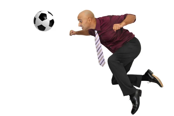 Zakenman Een Acrobatische Houding Met Een Voetbal Geïsoleerd Wit — Stockfoto