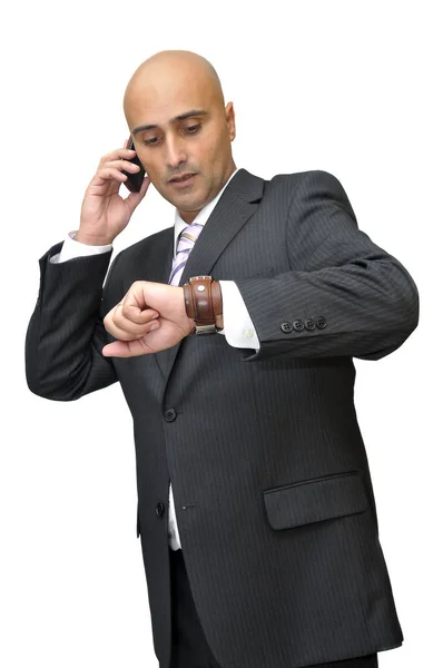 Biznesmen Telefonem Komórkowym Patrząc Czas Izolowany Kolorze Białym — Zdjęcie stockowe