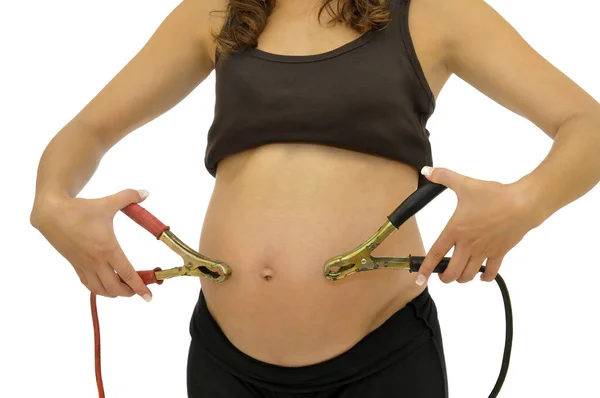 Беременная Женщина Животик Руки Батарейными Кабелями Изолированы Белом — стоковое фото