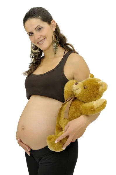 白で隔離されたテディベアを持っている妊婦 — ストック写真