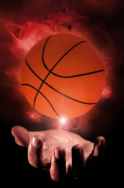 Menschliche Hand Mit Einem Basketball Isoliert Vor Schwarzem Hintergrund — Stockfoto