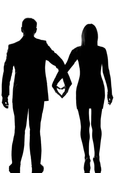 Amantes Caucasiano Casal Homem Mulher Andando Mãos Dadas Estúdio Silhueta — Fotografia de Stock