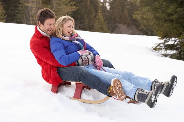 Close Young Couple Sledding — Stock Photo, Image