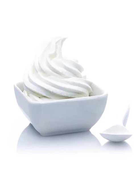 Pure Frozen Yogurt Dessert with vanilla blend. Isolated on white background.