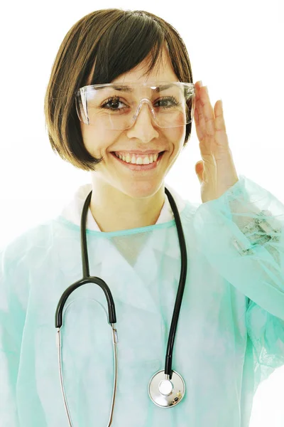 白で隔離された聴診器を持つ若い幸せな医師看護師の女性 — ストック写真