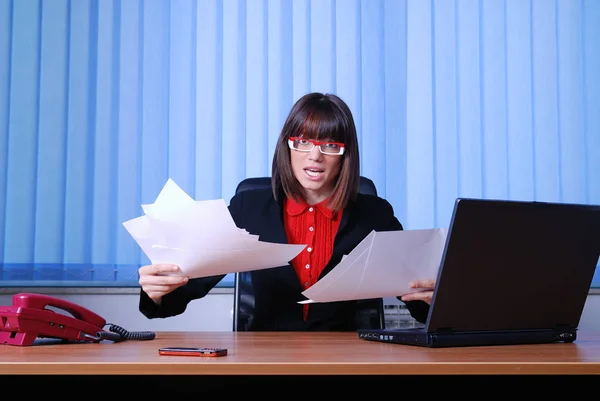 .angry businesswoman holding empty documents | UNFINISHED JOB CO