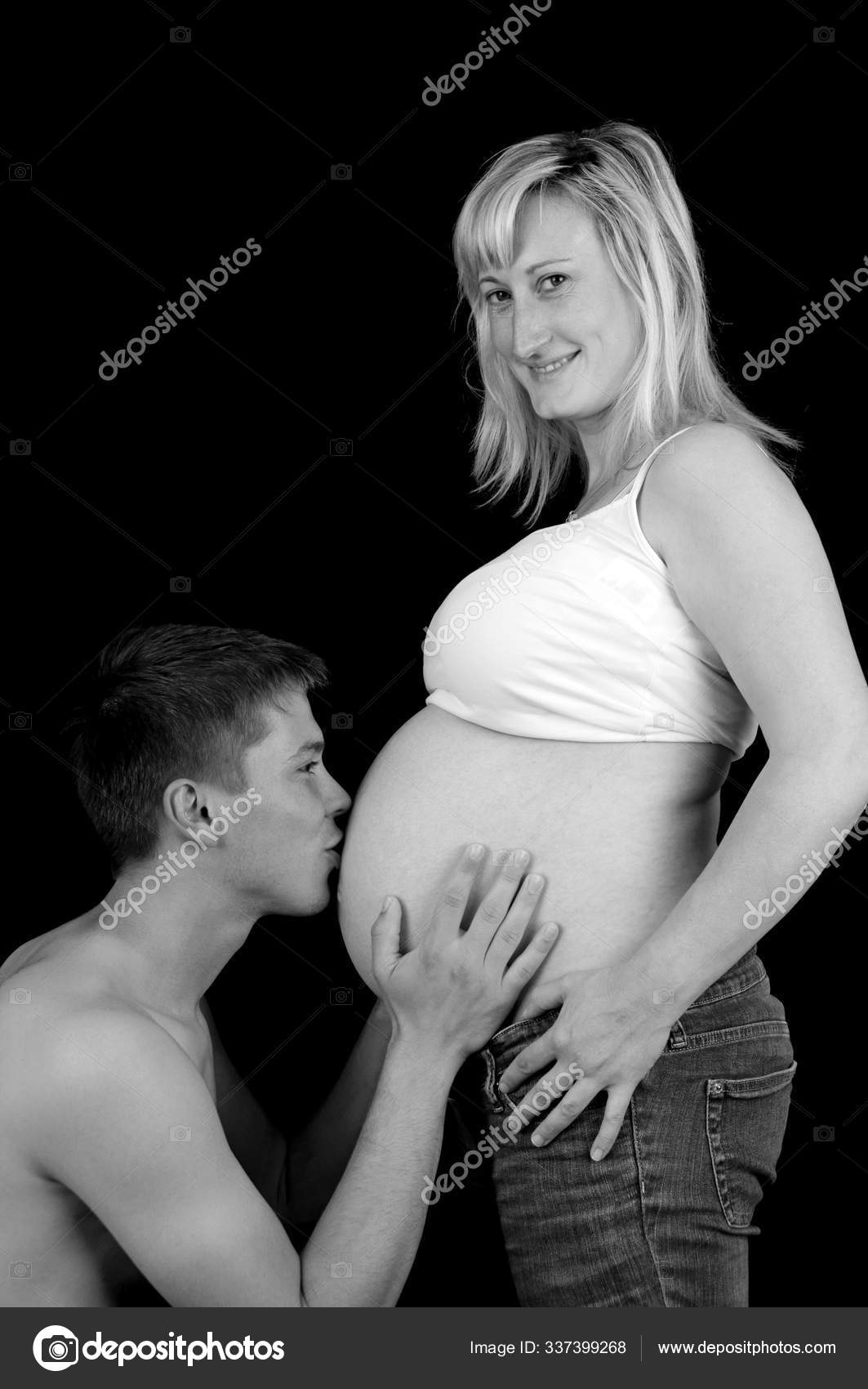 Man Kissing Stomach His Pregnant Wife Black White Stock Photo by ©PantherMediaSeller 337399268 photo