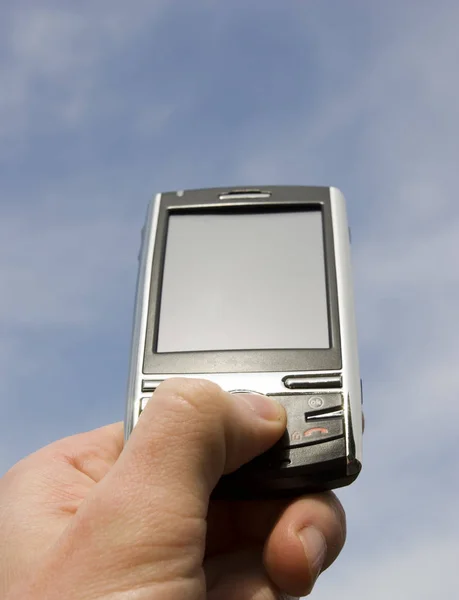 Handen Met Communicator Geïsoleerd Blauwe Achtergrond — Stockfoto