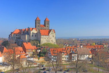 the schlossberg of quedlinburg with the collegiate church of st. servatii and the abbey buildings,saxony-anhalt,germany clipart