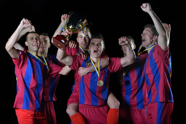 Equipo Futbolistas Celebrando Victoria Convertirse Campeón Juego Mientras Sostiene Golpe —  Fotos de Stock