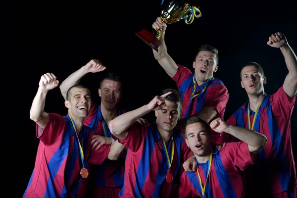 Equipo Futbolistas Celebrando Victoria Convertirse Campeón Juego Mientras Sostiene Golpe —  Fotos de Stock