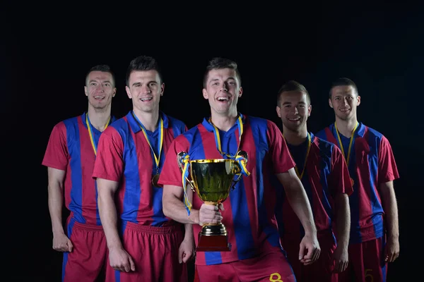 Equipo Futbolistas Celebrando Victoria Convertirse Campeón Juego Mientras Sostiene Golpe —  Fotos de Stock