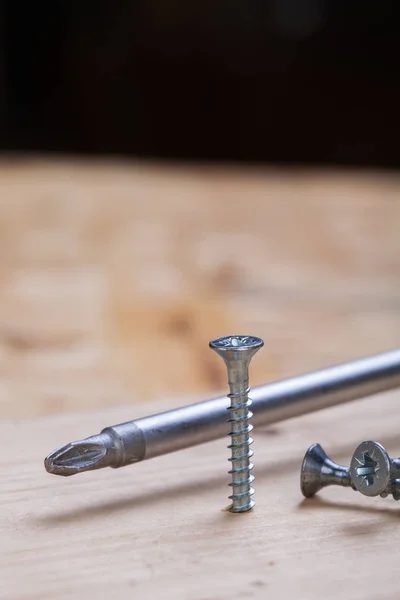 Close Cross Screwdriver Screws Wood While Working Home Workshop — 图库照片