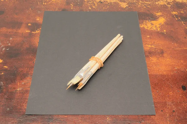 Zkouška Koncepce Papírový List Dřevěném Stole — Stock fotografie