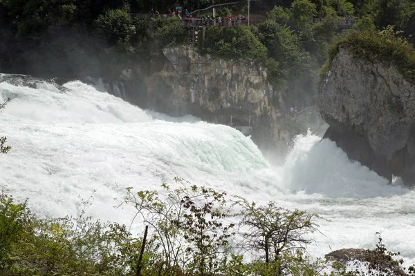 scenic view of majestic landscape with waterfall