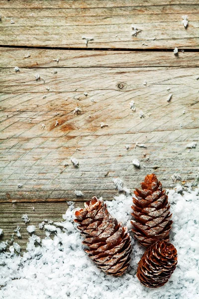 Pine Cone Rustic Christmas Background Three Cones Nestling Winter Snow — Stock Photo, Image