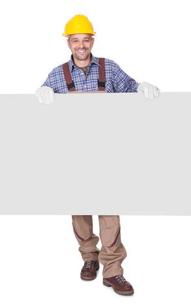 Portrait Happy Contractor Holding Placard White Background — Stock Photo, Image