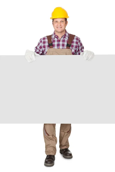 Construction Worker Presenting Empty Banner Isolated White Background — Stock Photo, Image