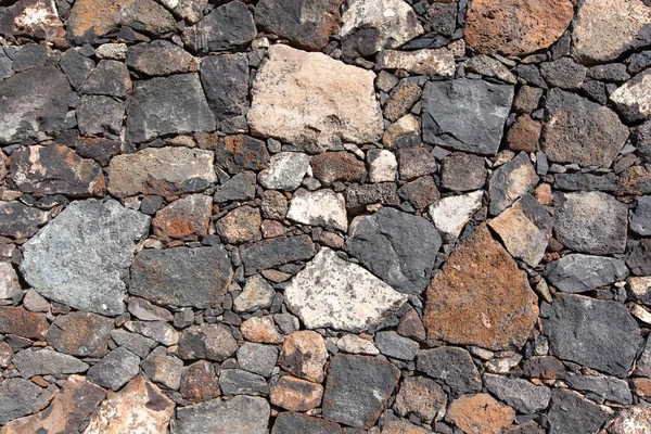 Kanarie Stenen Muur Met Verschillende Gekleurde Stenen — Stockfoto