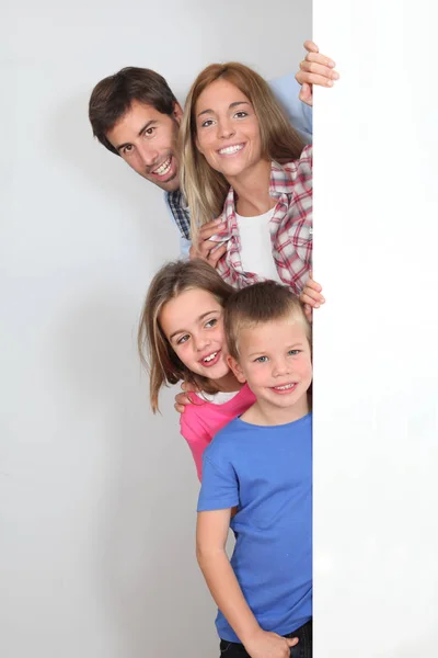 Happy Family Standing Whiteboard — Stock Photo, Image