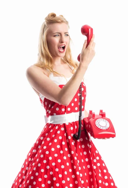 Rockabilly Elbiseli Bir Kadın Kırmızı Bir Telefon Ahizesinde Kükrer — Stok fotoğraf