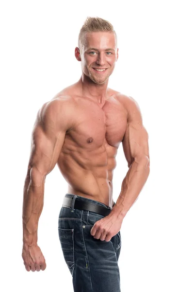Vältränad Ung Man Som Visar Musklerna Genom Olika Ställningar — Stockfoto
